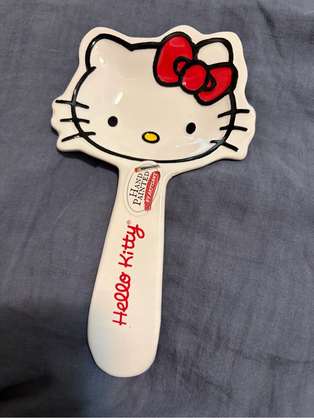 Hello Kitty White & Red Handheld Ceramic spoon rest